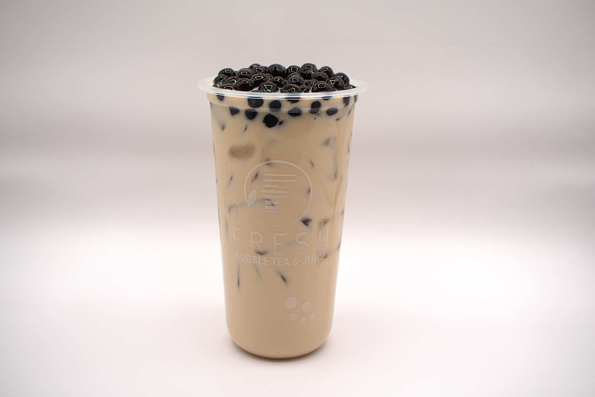 Fresh milk tea topped with black tapioca pearls